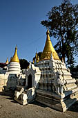 Myanmar - Sagaing, Shwe-kyet-kay a pagoda on a steep bank of the Irrawaddy river close to the two parallel bridges linking Sagaing and Amarapura. 